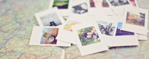cropped-close-up-of-pictures-photos-map.jpeg cropped close up of pictures photos map